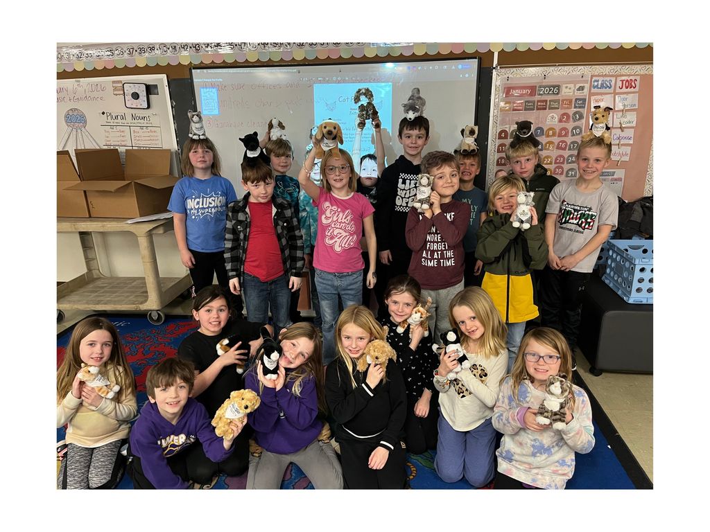 Second graders with their Two-by-Two pets