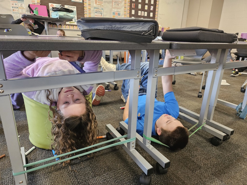 Just like Michelangelo painting the ceiling of the Sistine Chapel, 5th graders challenged themselves to create art using the underside of their desks 