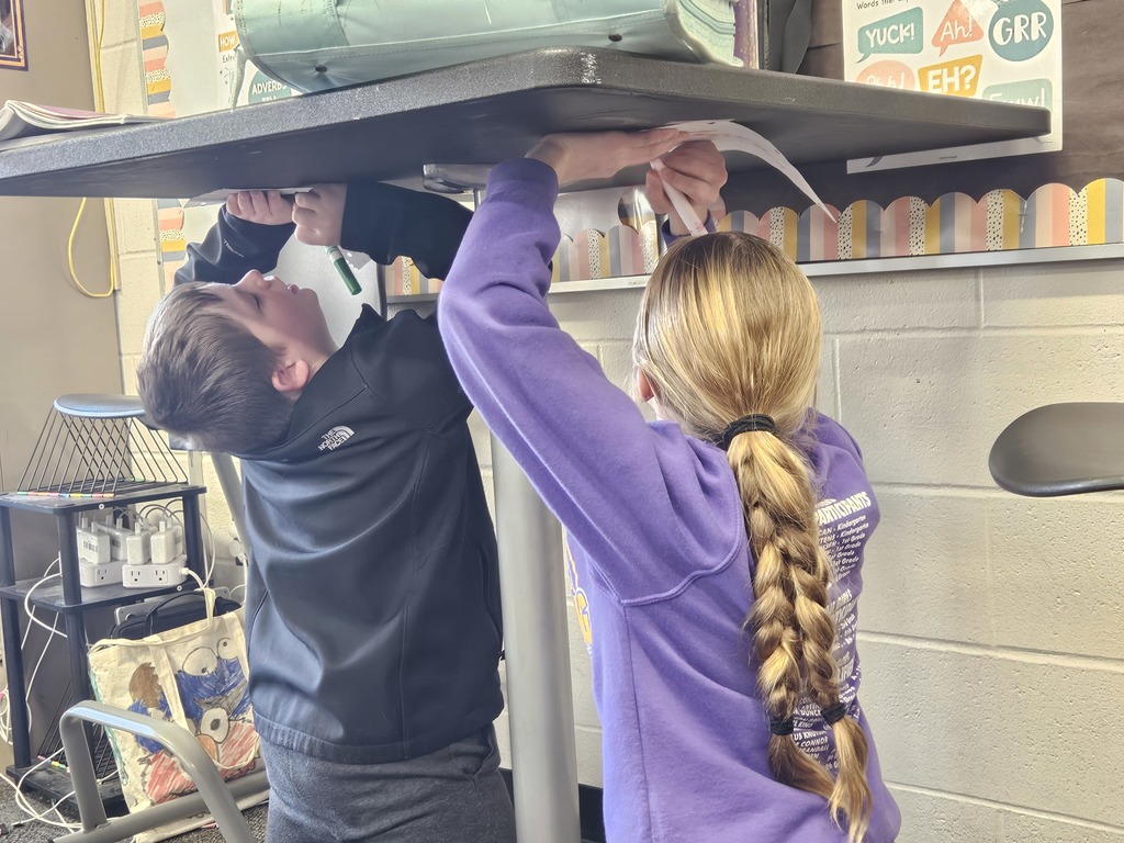 Just like Michelangelo painting the ceiling of the Sistine Chapel, 5th graders challenged themselves to create art using the underside of their desks 