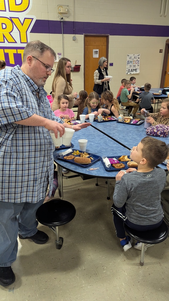 Students enjoying hot chocolate during lunch