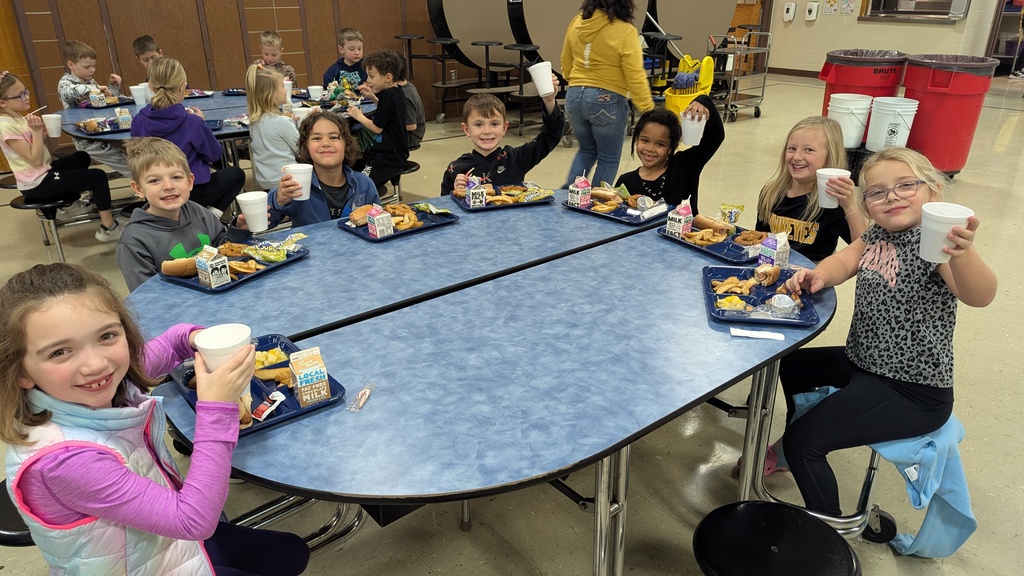 Students enjoying hot chocolate during lunch