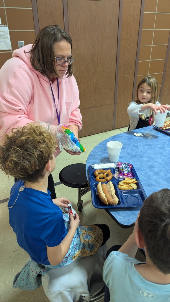 Students enjoying hot chocolate during lunch