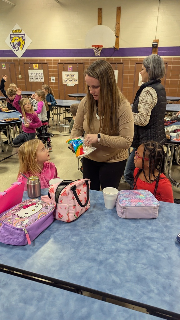 Students enjoying hot chocolate during lunch