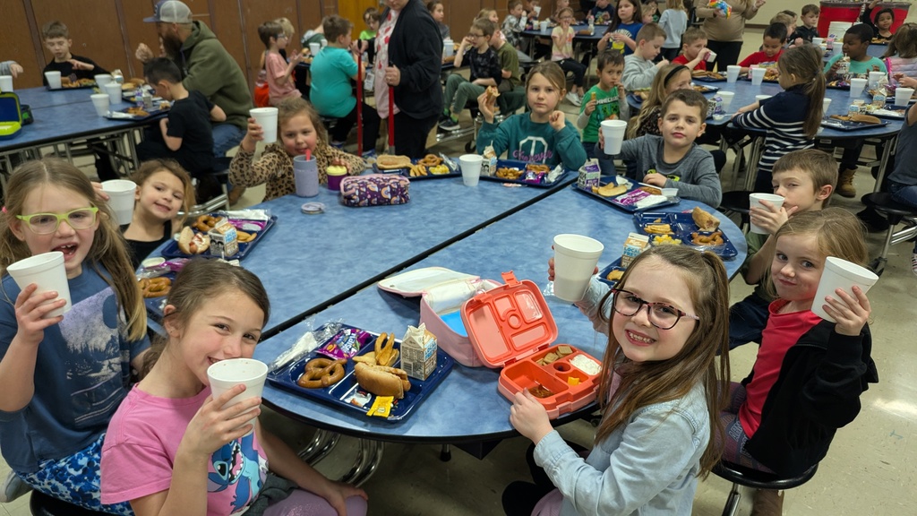 Students enjoying hot chocolate during lunch