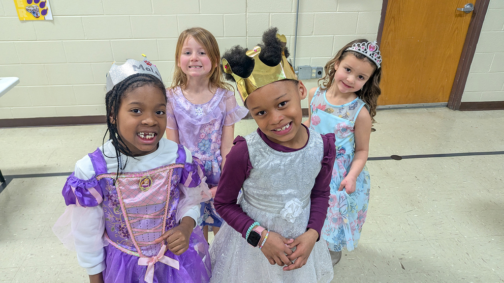 Kindergartners dancing at their royal ball