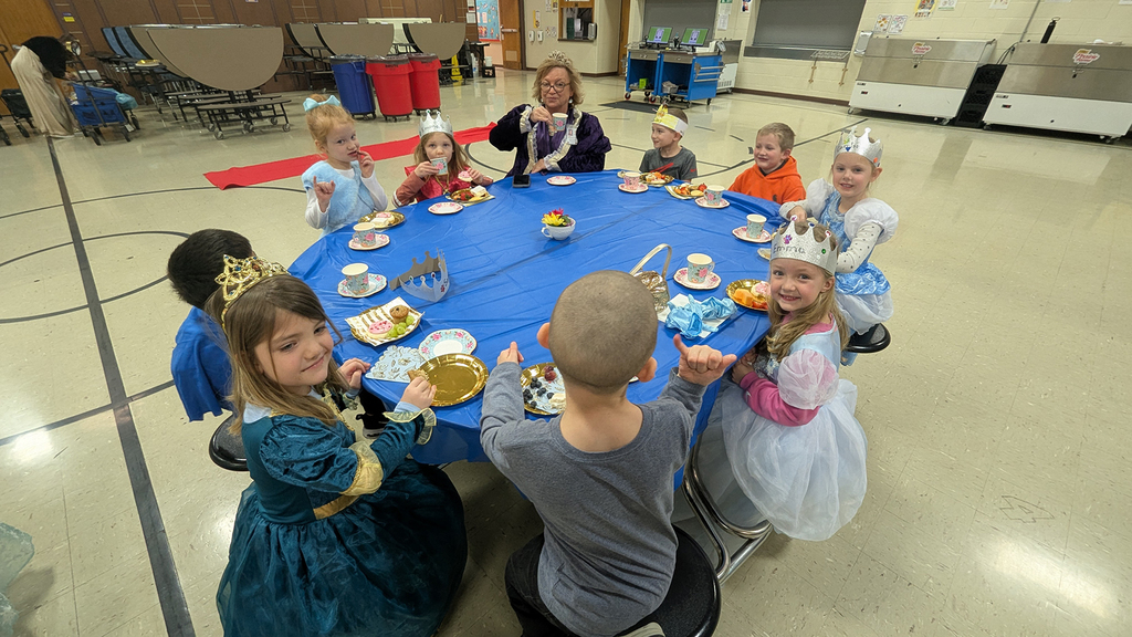 Kindergartners enjoying "tea" and treats