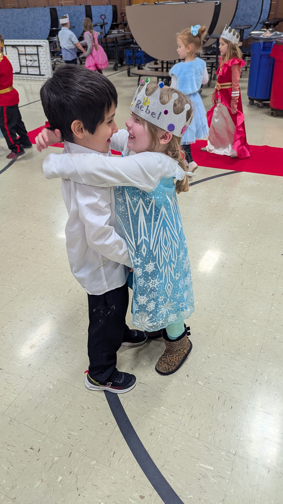 Kindergartners dancing at their royal ball