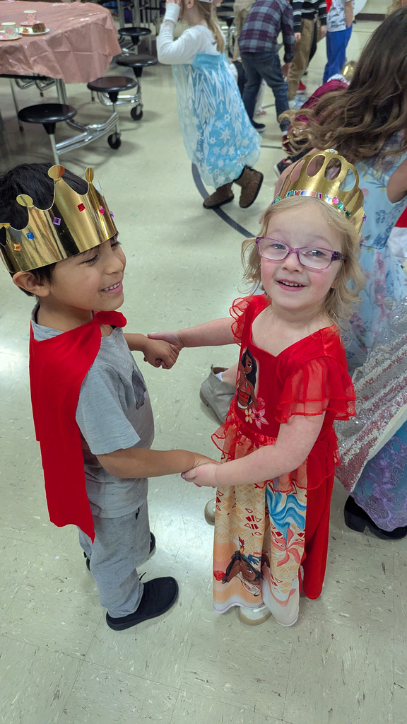 Kindergartners dancing at their royal ball