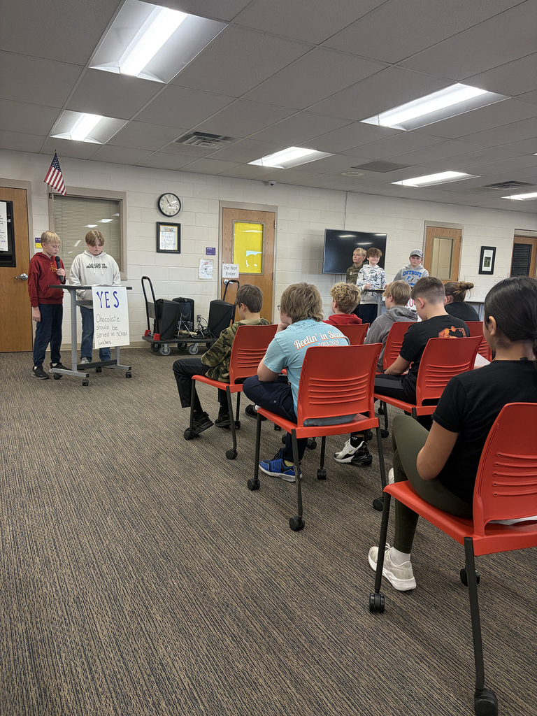 6th grade debate on “Should chocolate be included in school lunches?”