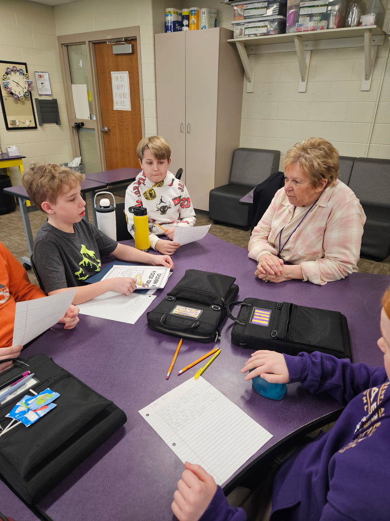 Students in Mrs. Hofer and Mrs. Lueders’ 5th grade WIN group  listening to food truck owner Linda Jacobsen