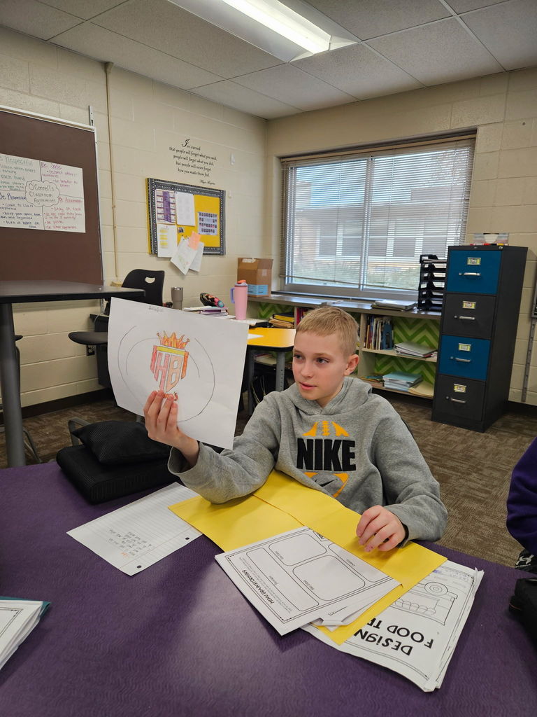 Students in Mrs. Hofer and Mrs. Lueders’ 5th grade WIN group  listening to food truck owner Linda Jacobsen