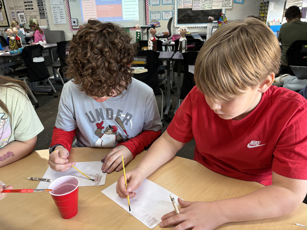 Students crafting their own invisible ink messages