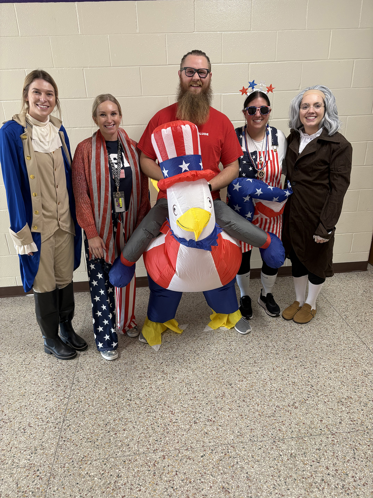 4th grade teachers dressed as American Revolution and patriotic characters