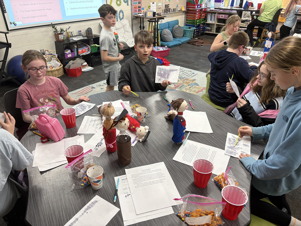 Students crafting their own invisible ink messages