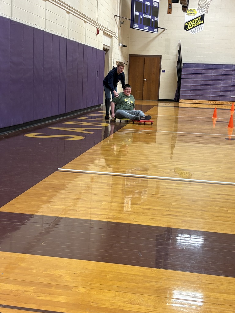 Peer Stem class doing bobsledding  as part of their recreation of the Winter Olympics