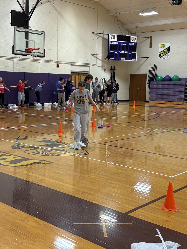 Peer Stem class doing speed skating as part of their recreation of the Winter Olympics