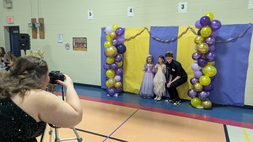 Kids getting their photo taken in the photo booth