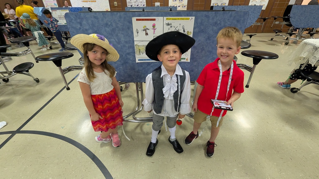 Kindergartners presenting what they learned about colonial trades