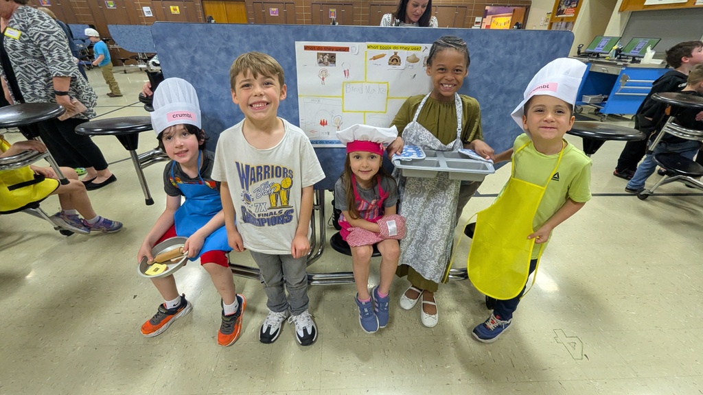 Kindergartners presenting what they learned about colonial trades