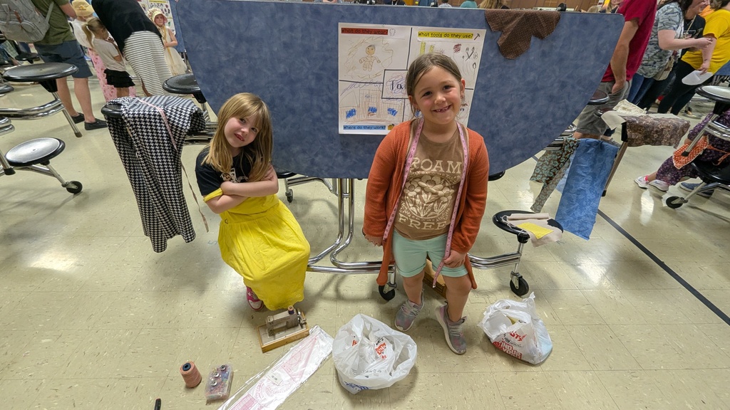 Kindergartners presenting what they learned about colonial trades