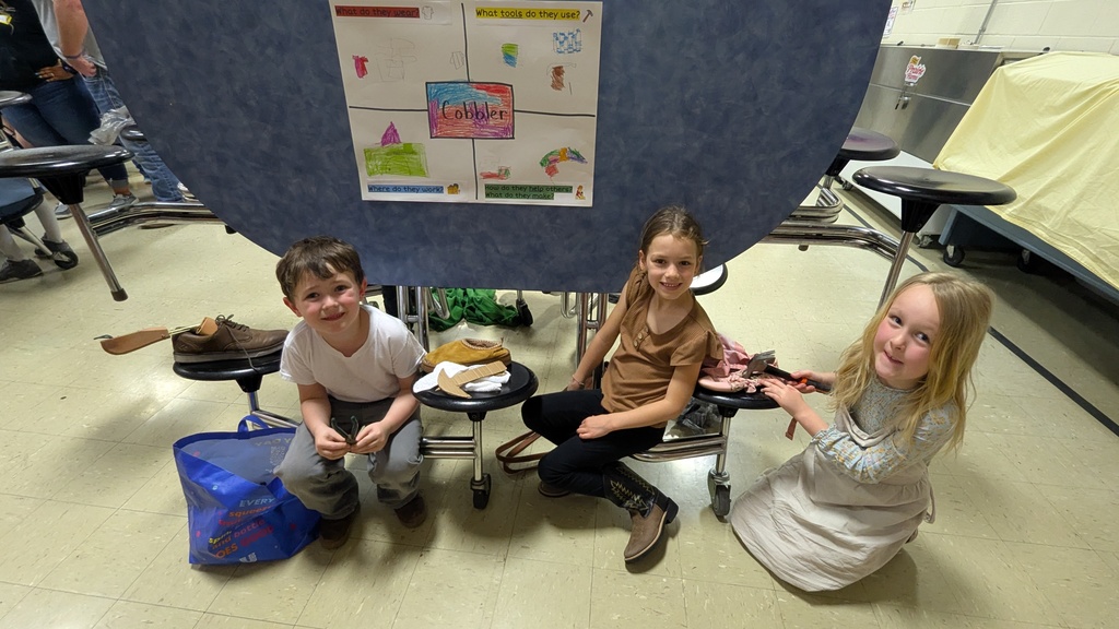 Kindergartners presenting what they learned about colonial trades