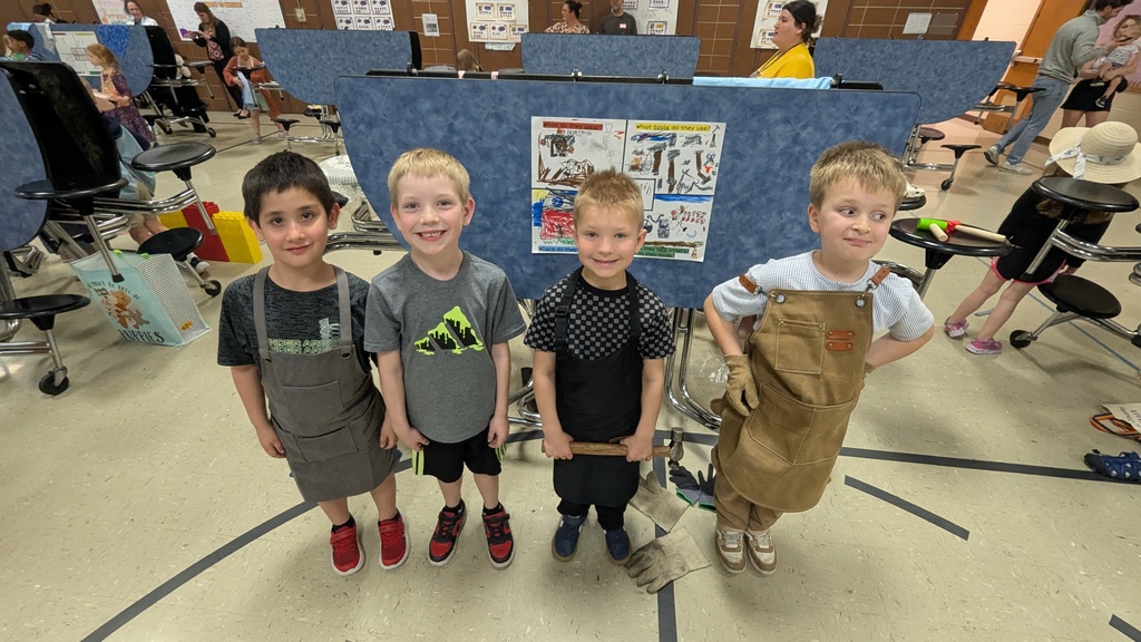 Kindergartners presenting what they learned about colonial trades