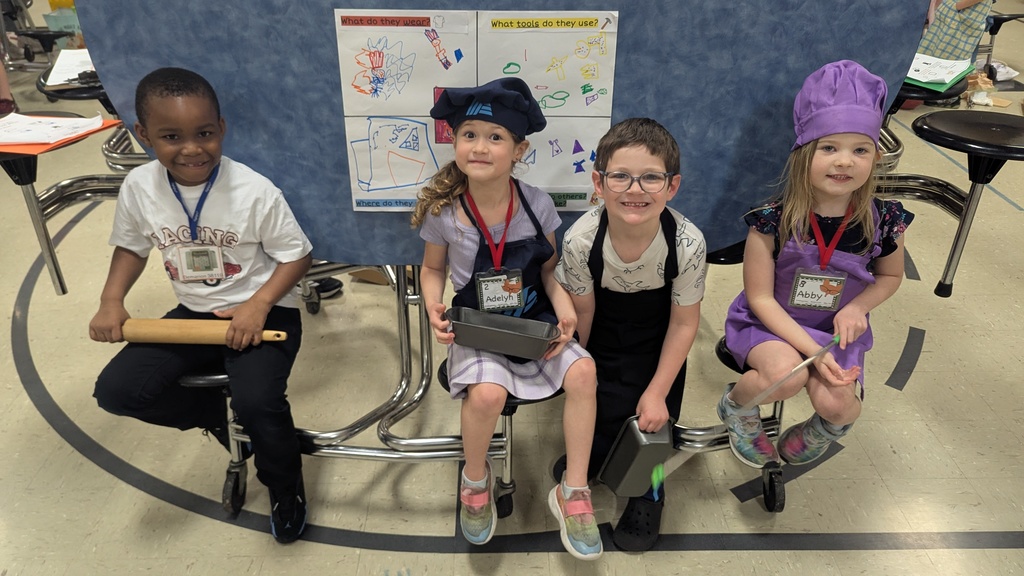 Kindergartners presenting what they learned about colonial trades