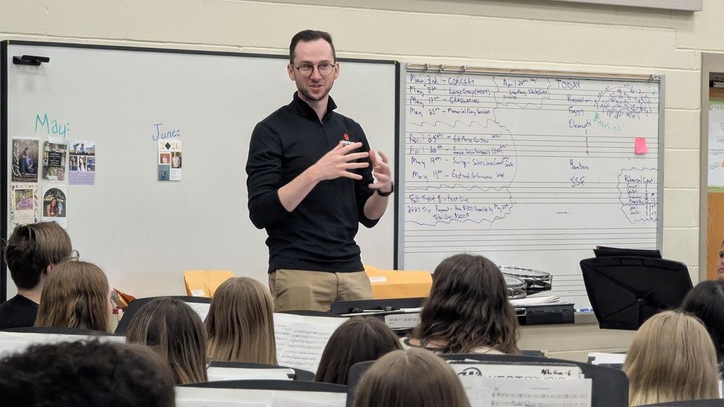 CDHS band playing with the Wartburg College Wind Ensemble