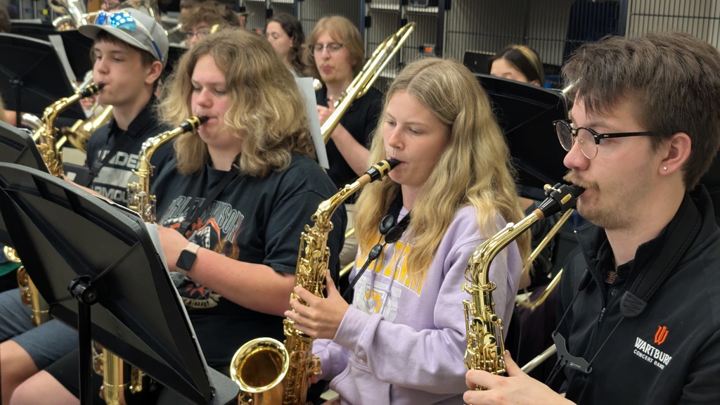 CDHS band playing with the Wartburg College Wind Ensemble