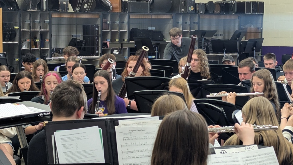 CDHS band playing with the Wartburg College Wind Ensemble