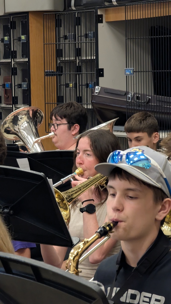 CDHS band playing with the Wartburg College Wind Ensemble