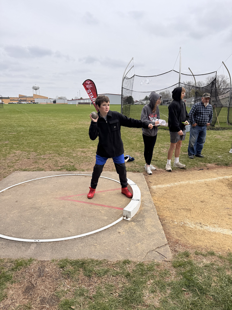 Christopher Shenker throwing shot put