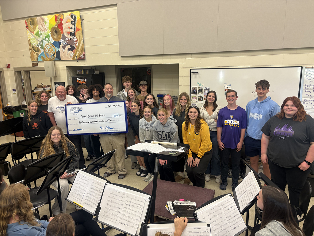 Ed Morse Chevrolet GMC DeWitt presenting check to CDHS Band