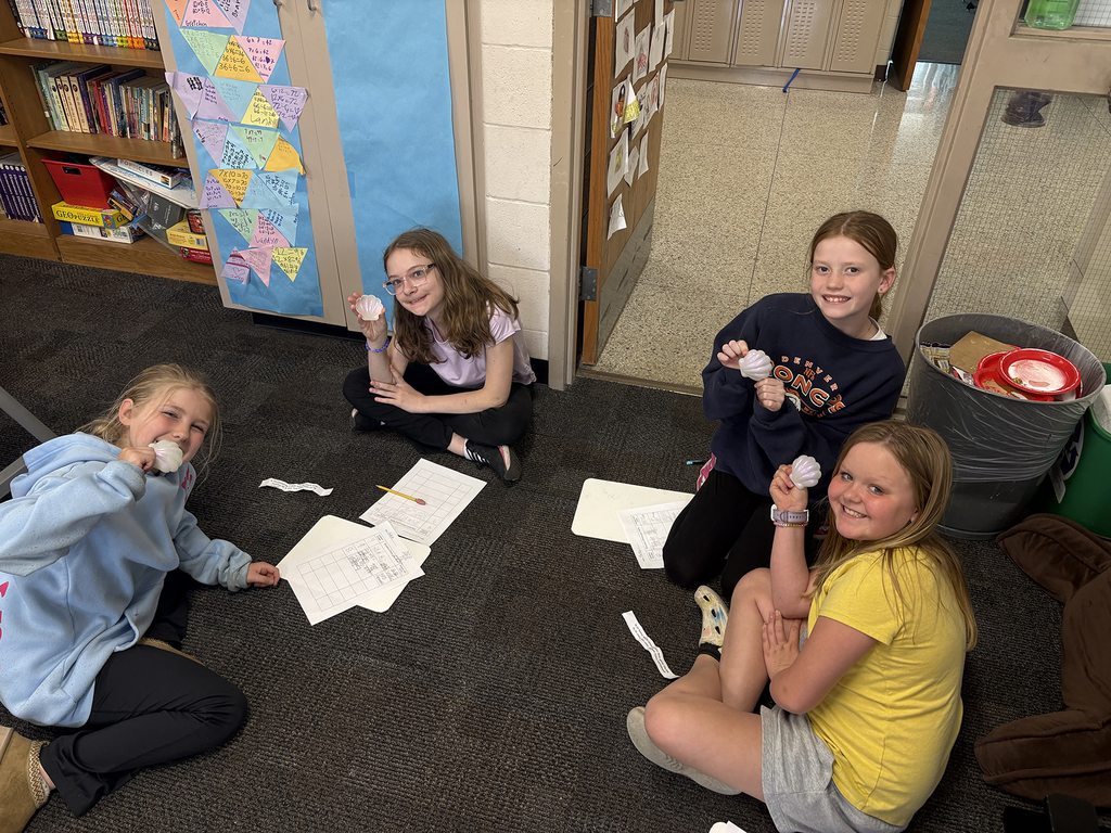 4th graders working on an activity during Treasure Island Day
