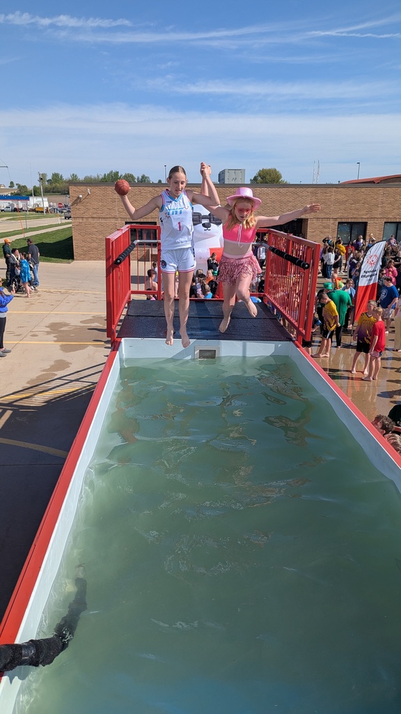 Students jumping into the icy waters for the Polar Plunge