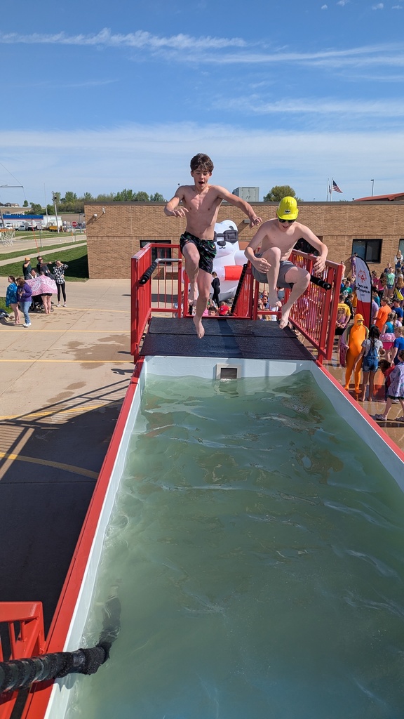 Students doing cannonballs into the chilly waters 