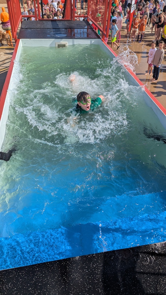 Student making big splash after jumping into the icy waters