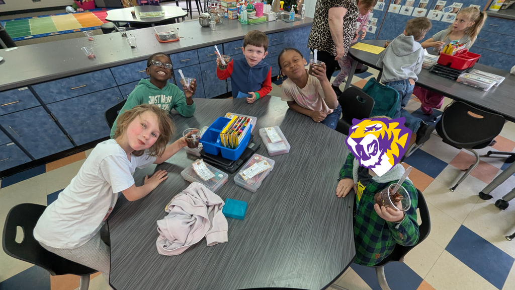 Kindergarteners enjoying their "dirt cups"