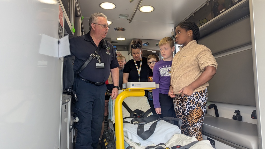 Students touring the ambulance and learning about its features
