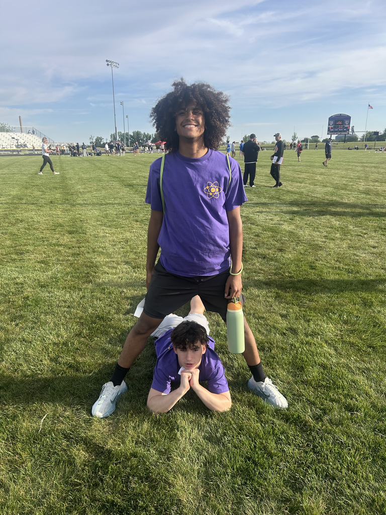 Central DeWitt and Walhert track & field teams wearing shirts in honor of Trisha Brookins