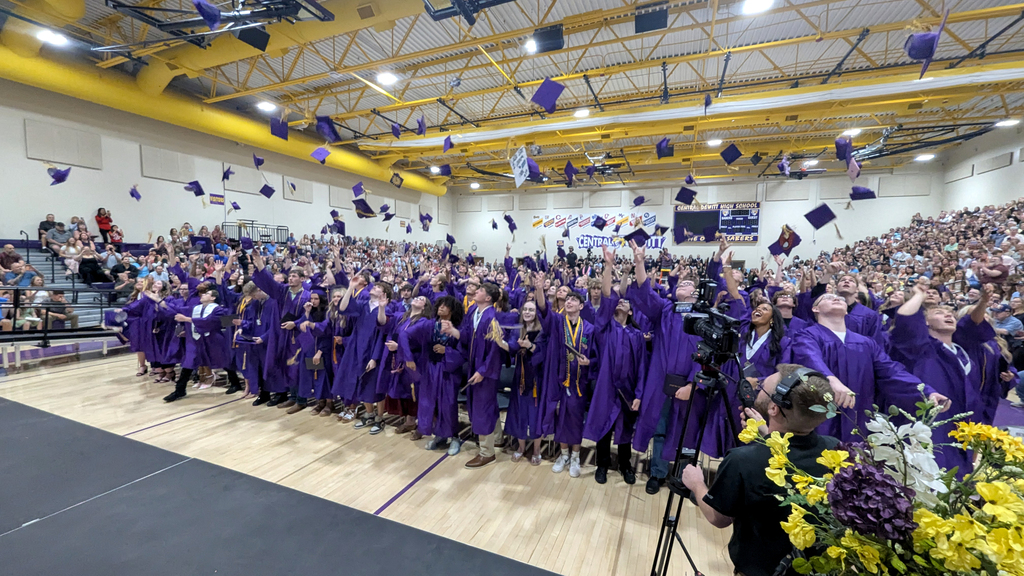 Graduates throwing their caps at Commencement
