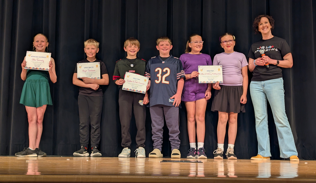 Mrs. Magill handing out art awards