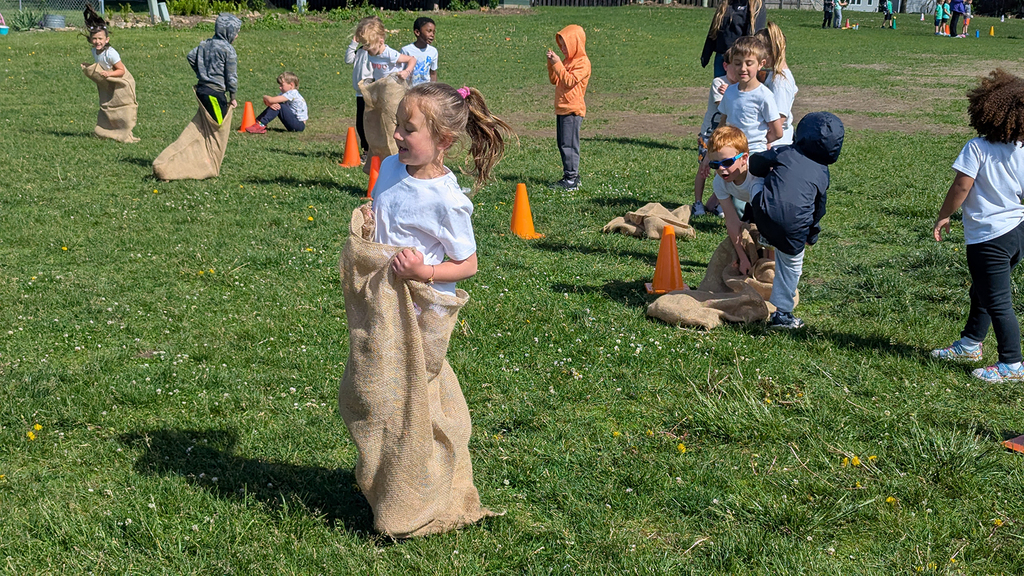 Ekstrand students participating in potato sack races