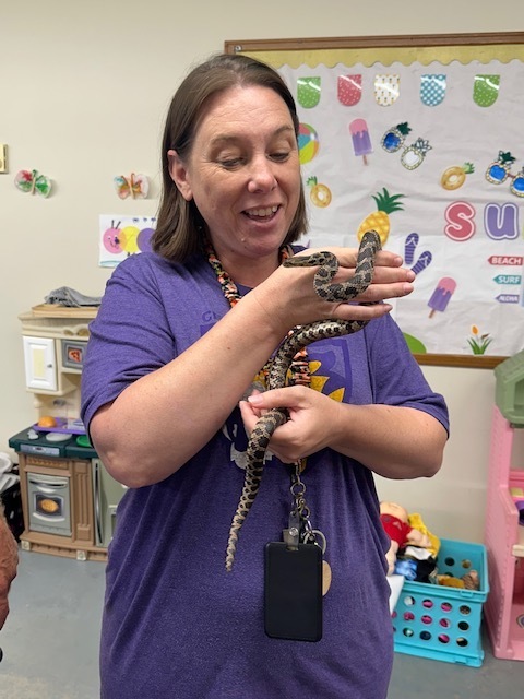 Amber Kaczinski holding a snake