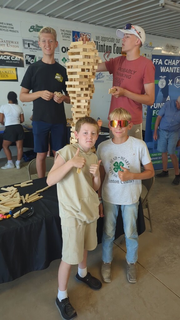 Sabers building a tower with blocks in the exhibit hall