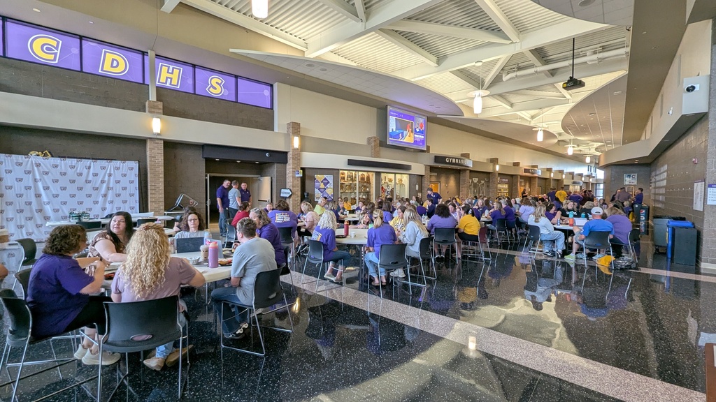 Teachers and staff eating breakfast on their first day back