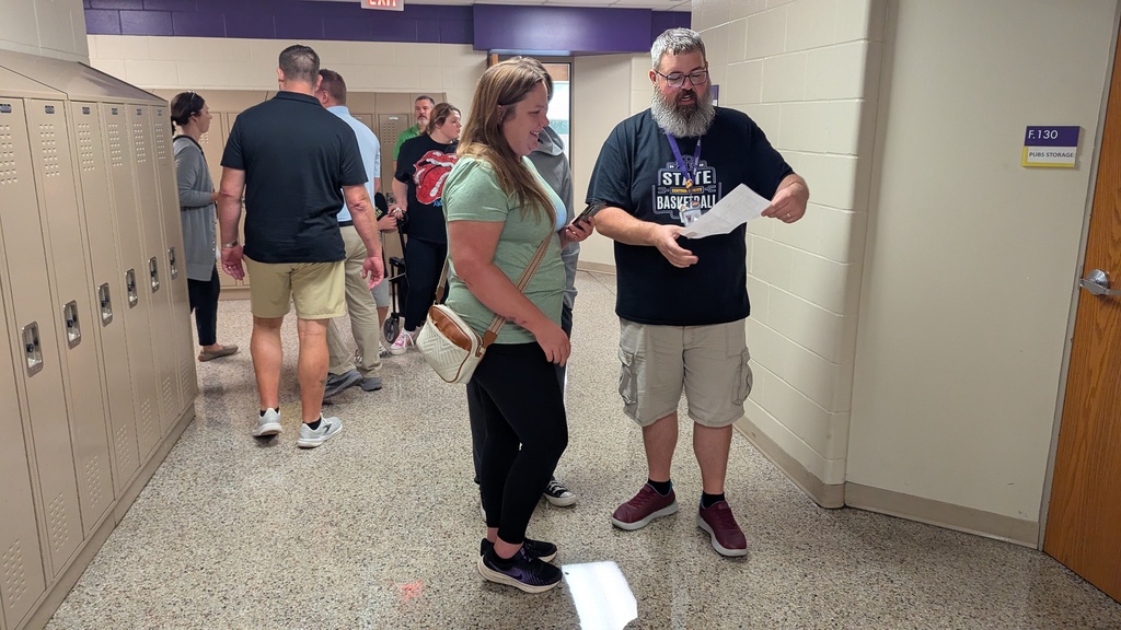 Mr. LaPage helping a family at the high school