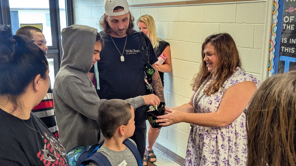 Mrs. Sikkema handing out suckers