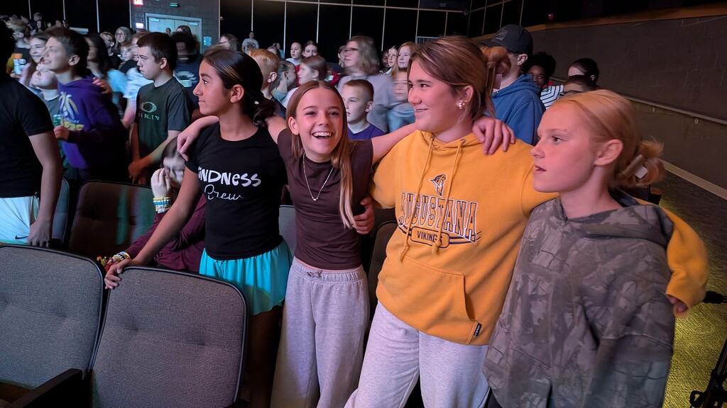 Middle school students singing Country Roads together
