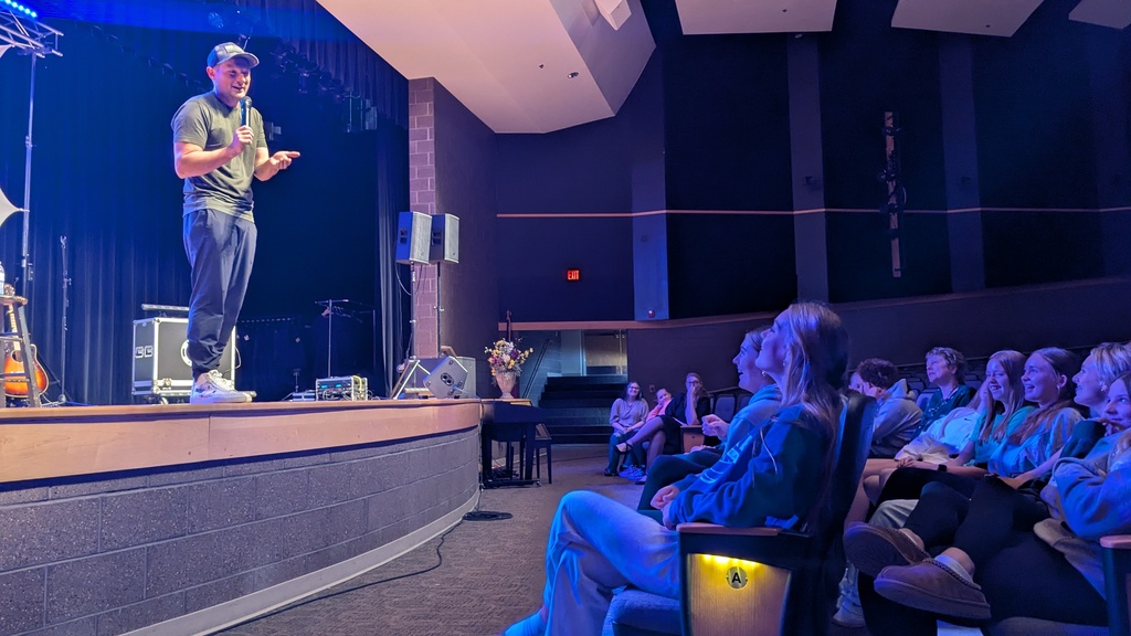Motivational speaker Cory Greenwood speaking to Central DeWitt Middle School students